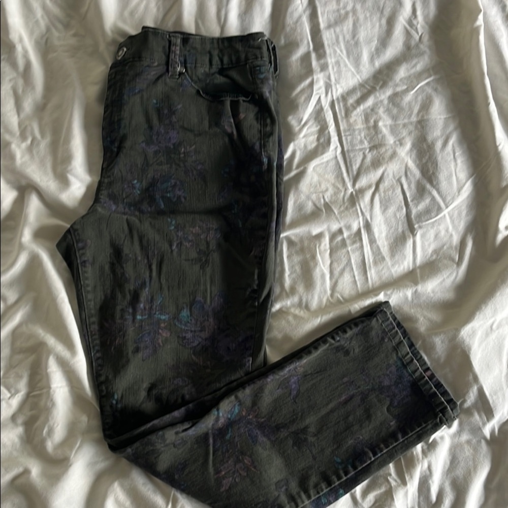 Black jeans with purple floral pattern